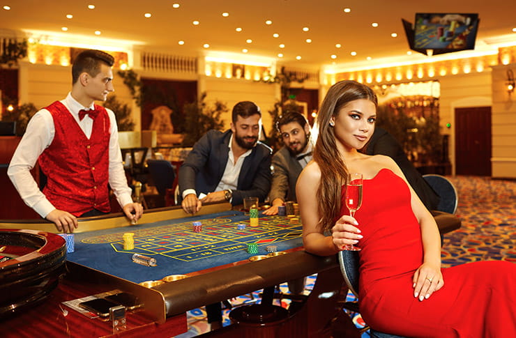 People Around a Playing Table at Fire Keepers Casino