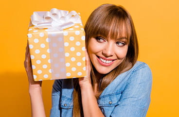 Woman Holding a Gift Box