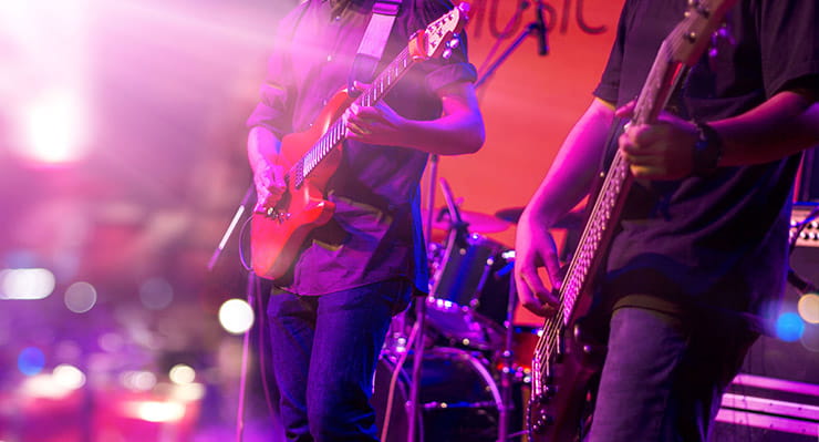 Men Playing on Guitars at Island Resort Casino