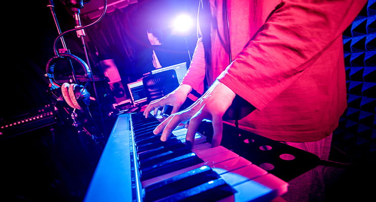 Man Playing on a Piano at Kewadin Casino